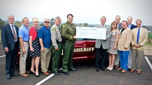 SO-DARE-Money-jpg_3721243_ver1.0_640_360 posse supporters posing with the donation check