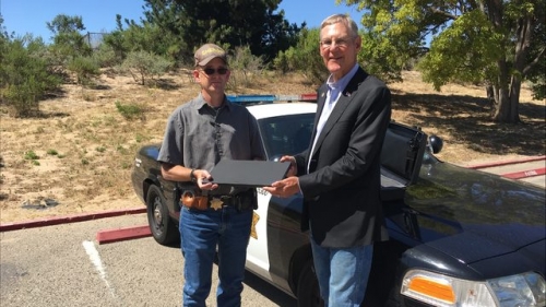 Richard Kline Receiving a check
